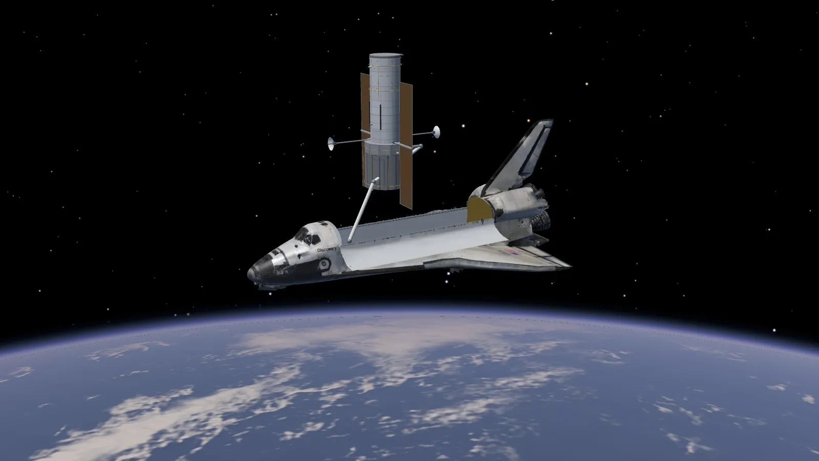 STS-31: Discovery’s robot arm holds the Hubble Space Telescope over the payload bay, its solar arrays and antennas out, ten minutes before letting it go
